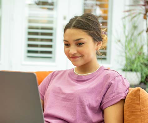 student using a laptop computer